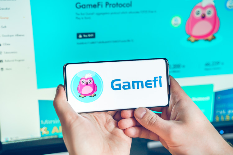 Криптовалюта GameFi Protocol открыта на экране смартфона.
