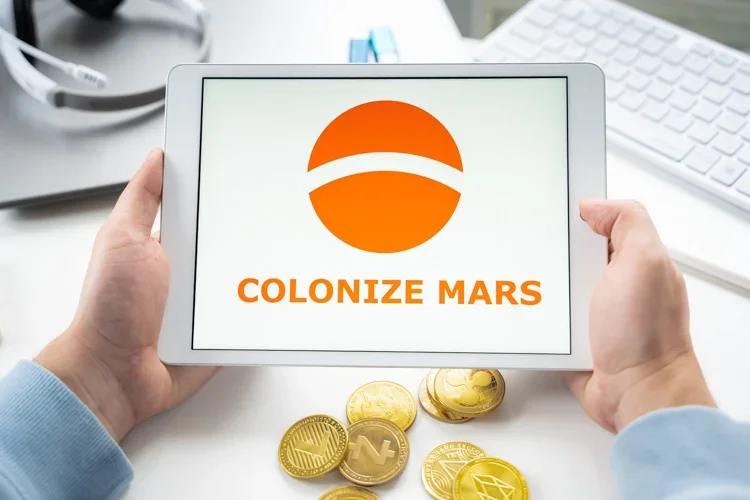 Криптоигра Colonize Mars открыта на экране планшета.