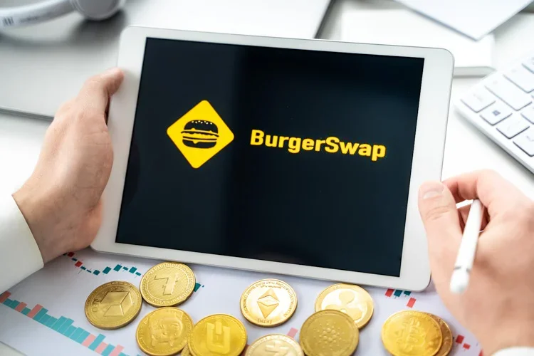 Биржа BurgerSwap открыта на экране планшета.